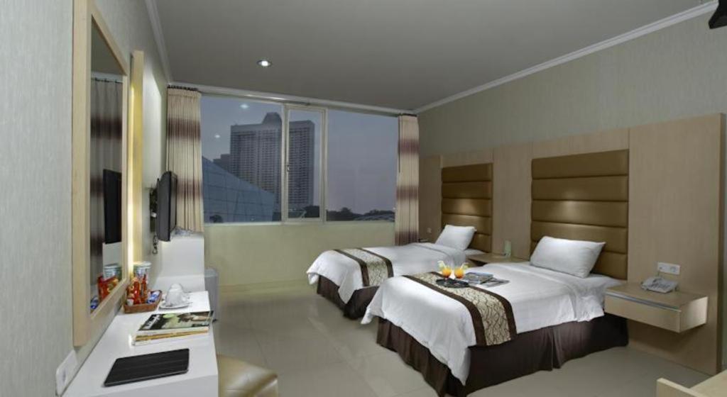 Oyo 235 Maumu Hotel & Lounge Сурабая Екстер'єр фото